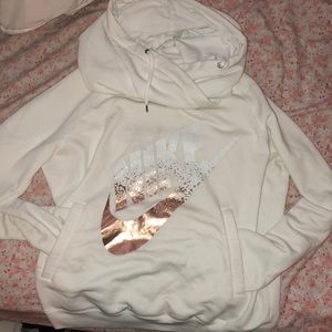 White and gold Nike sweater